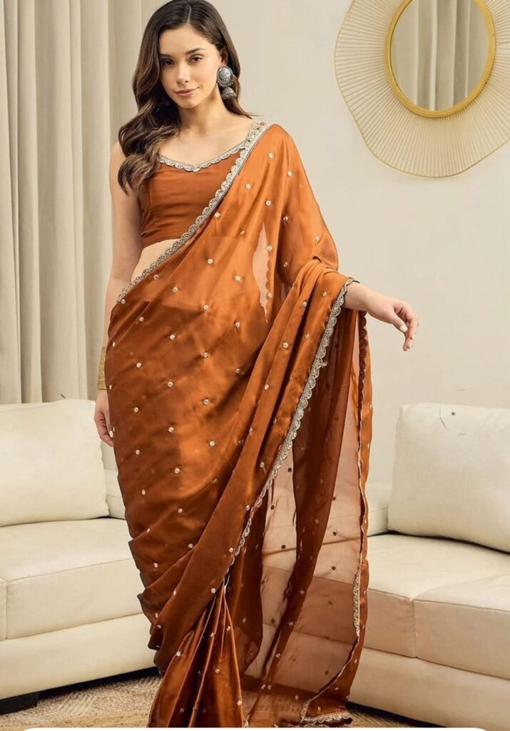 Rust orange embellished saree
