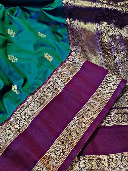 Teal green saree fabric beside an ornate purple and gold-coloured pallu