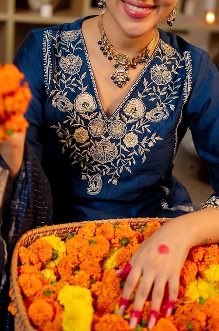 Floral embroidery around the V-shaped neckline of a blue KLOSIA kurta