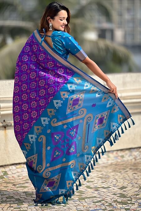 Back view of SGF11 saree showing blue patterned pallu and tasselled ends