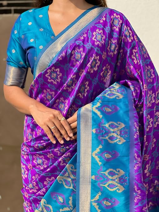 Close-up of decorative motifs and metallic border on SGF11 purple and blue saree