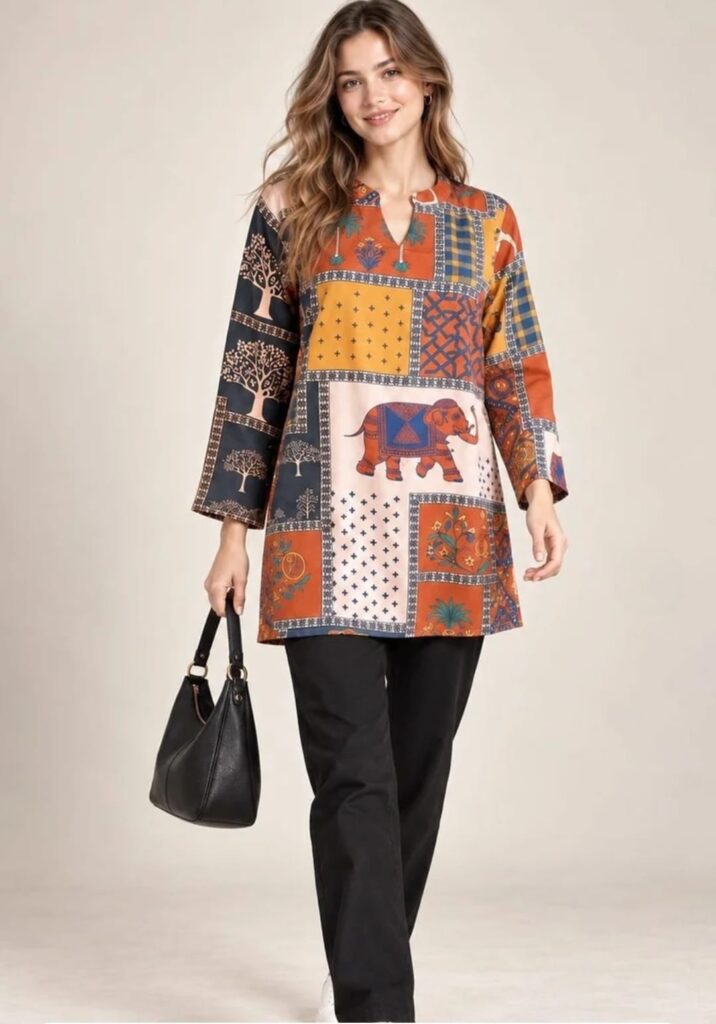 Ethnic print tunic paired with black pants