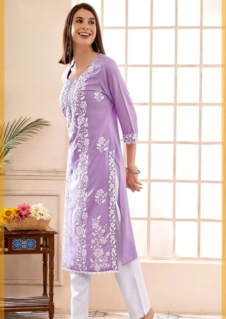 Angled view of lavender straight kurta with three-quarter sleeves and side slit