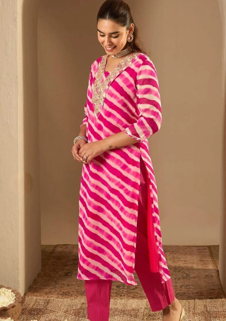 Side view of pink and cream Leheriya straight kurta with side slit