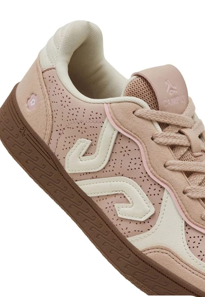 Floral perforations and cream detailing on Campus pink sneaker