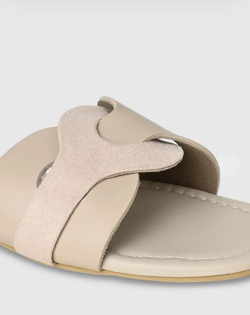 Top and outsole views of CAI beige open toe flats